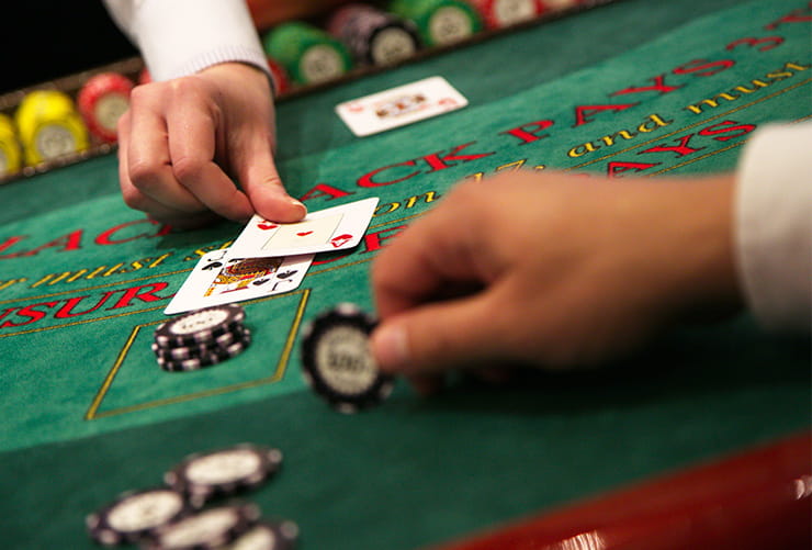 A man playing blackjack.